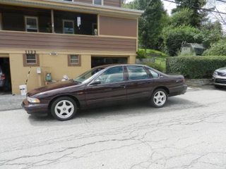 Illustration for article titled For $8,800, This 1995 Chevy Impala SS Is A Six Shooter